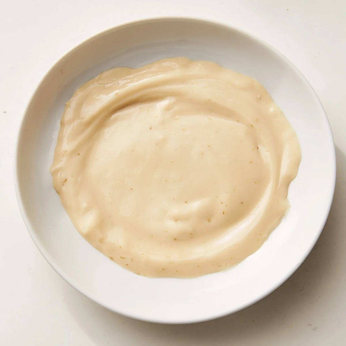 Image showcases the final cooled creamy filling, ready to be spread into pastries or cakes.