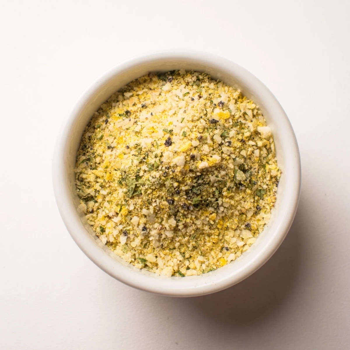A close-up of freshly made garlic salt, perfect for seasoning grilled meats and vegetables.