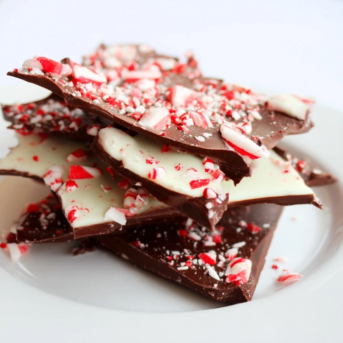 Cool, refreshing Chocolate Peppermint Bark, sprinkled with crushed candy canes, ready to enjoy.