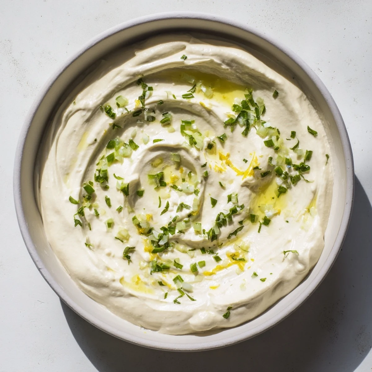 Cool, creamy Greek Yogurt Dip, seasoned with fresh herbs, is perfect for dipping and spreading.