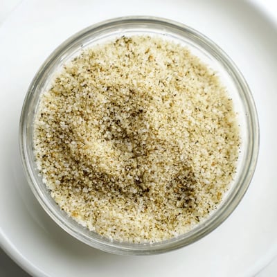 Close-up of freshly made garlic salt seasoning blend, ready to enhance your cooking.